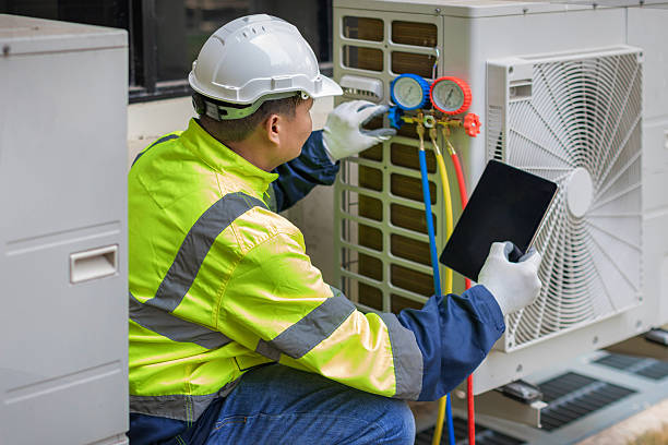 Professional Air Duct Cleaning technician working in New Caney, TX